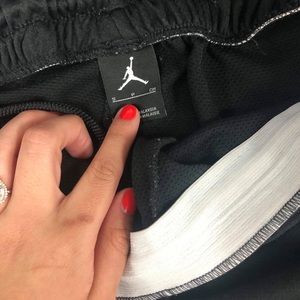 Simple black Jordan basketball shorts.